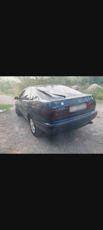 Toyota Carina VI (T190) E 1.8 MT