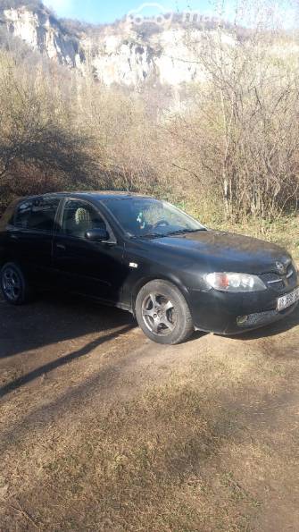 Nissan Almera II (N16) Рестайлинг 1.5 MT