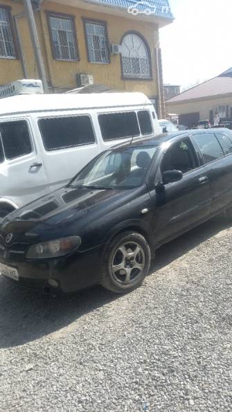 Nissan Almera II (N16) Рестайлинг 1.5 MT