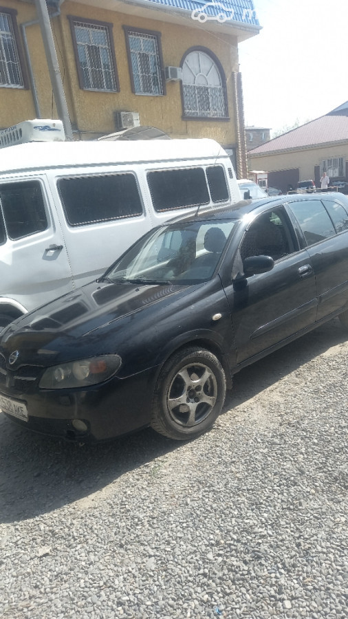 Nissan Almera II (N16) Рестайлинг 1.5 MT