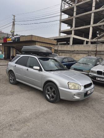 Subaru Impreza II Рестайлинг 1 2.0 AT 4WD