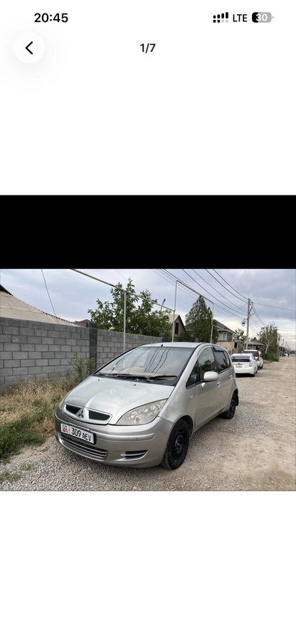 Открыть фото Mitsubishi Colt VI 1.3 CVT