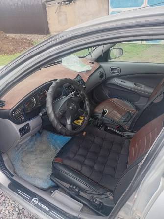 Nissan Almera II (N16) 1.8 MT