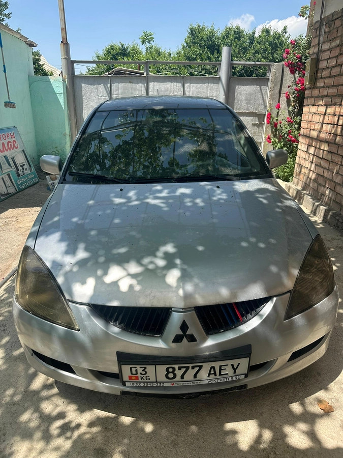 Открыть фото Mitsubishi Lancer IX 1.3 MT