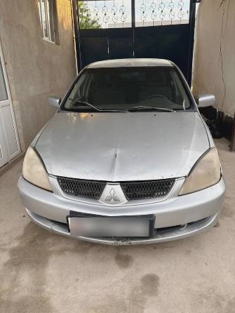 Mitsubishi Lancer IX Рестайлинг 1.6 MT