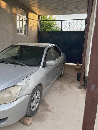 Mitsubishi Lancer IX Рестайлинг 1.6 MT