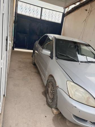 Mitsubishi Lancer IX Рестайлинг 1.6 MT