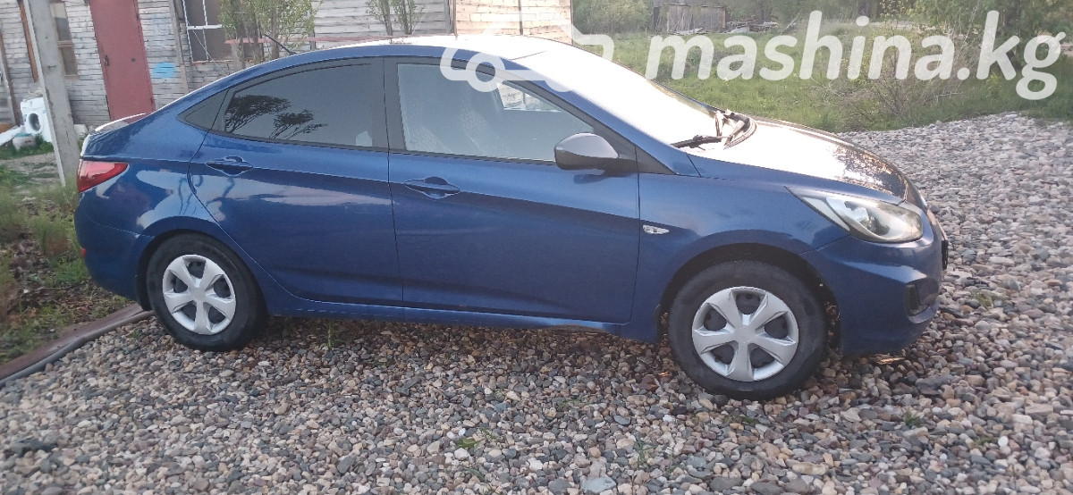 Открыть фото Hyundai Solaris I 1.6 MT