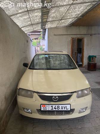 Mazda 323 V (BA) 1.5 AT