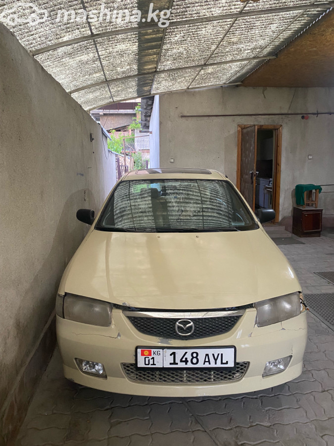 Mazda 323 V (BA) 1.5 AT