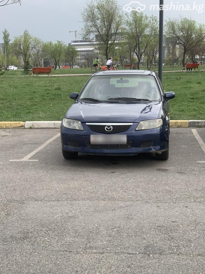 Mazda 323 VI (BJ) Рестайлинг 1.6 MT