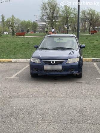 Mazda 323 VI (BJ) Рестайлинг 1.6 MT