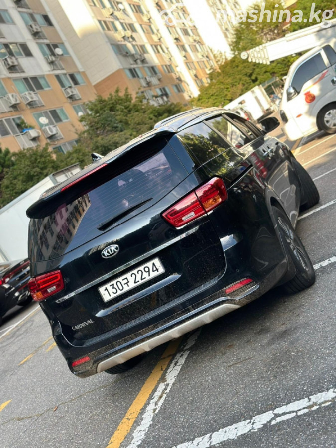 Открыть фото Kia Carnival III 2.2d AT