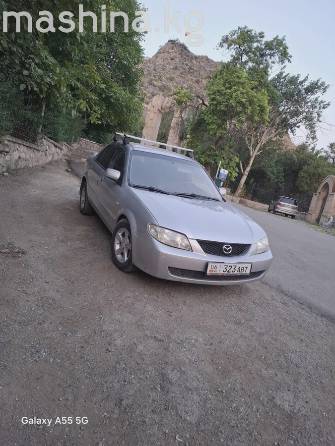 Mazda 323 VI (BJ) Рестайлинг 1.6 MT