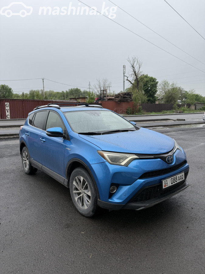 Открыть фото Toyota RAV4 IV (XA40) Рестайлинг 2.5hyb CVT 4WD