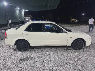 Mazda 323 VI (BJ) 1.5 MT