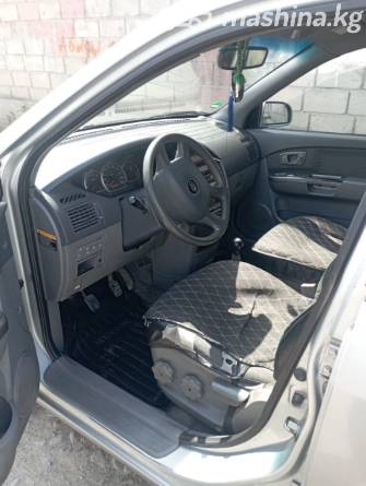 Kia Carens I (RS) Рестайлинг 1.8 MT