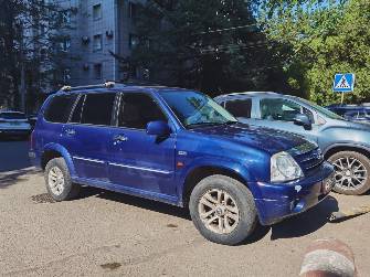 Suzuki Grand Vitara II Рестайлинг 2.5 MT 4WD