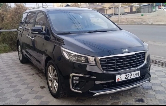 Открыть фото Kia Carnival III 2.2d AT