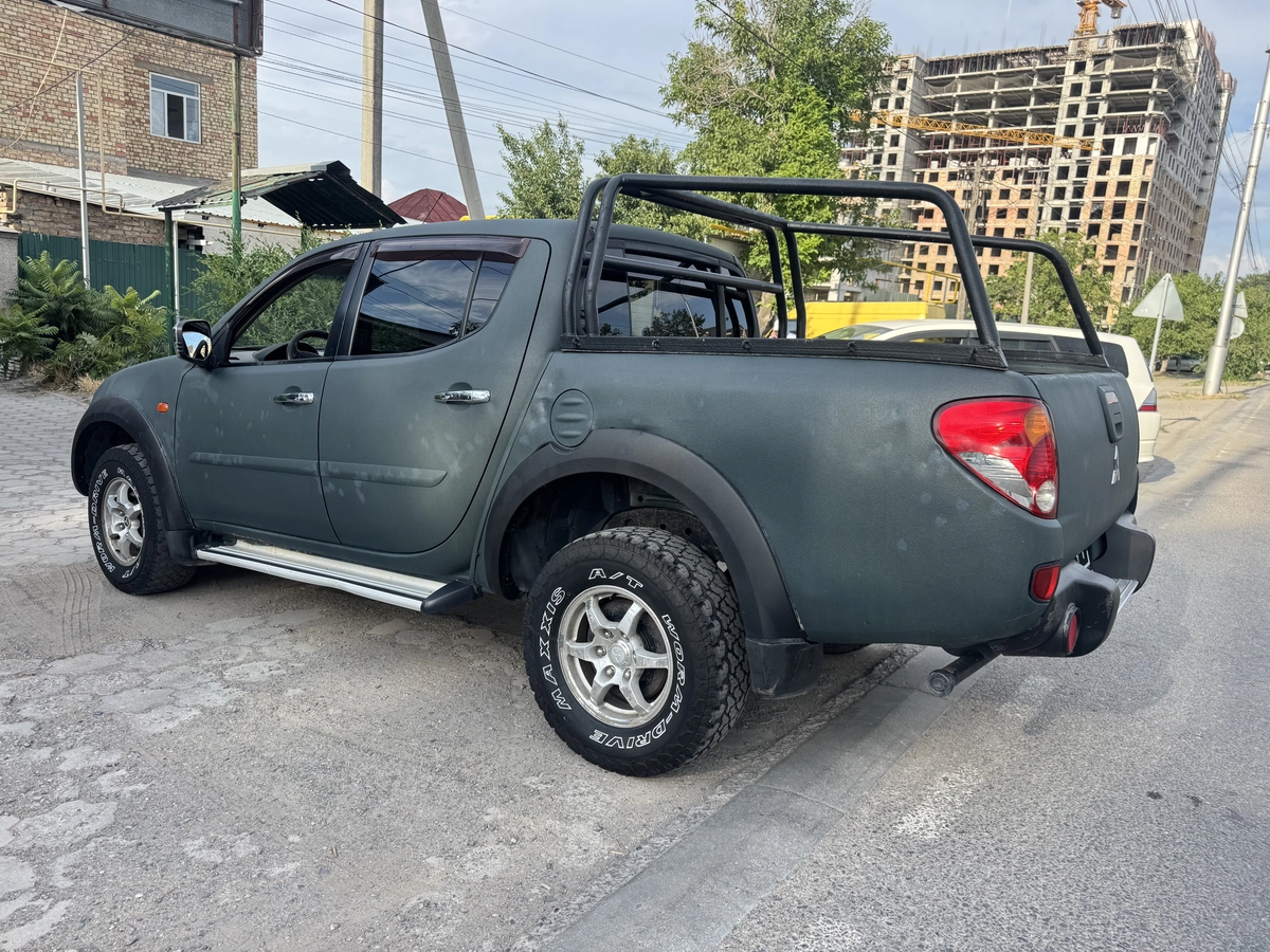 Открыть фото Mitsubishi L200 IV 2.5d MT 4WD