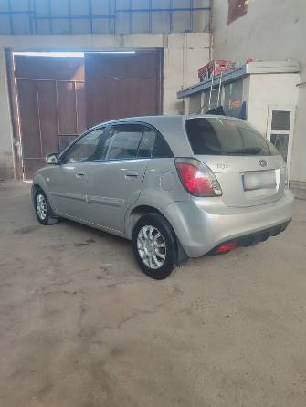 Kia Rio II Рестайлинг 1.4 MT