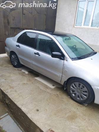 Mitsubishi Lancer IX Рестайлинг 1.3 MT