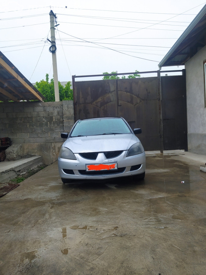 Mitsubishi Lancer IX Рестайлинг 1.3 MT