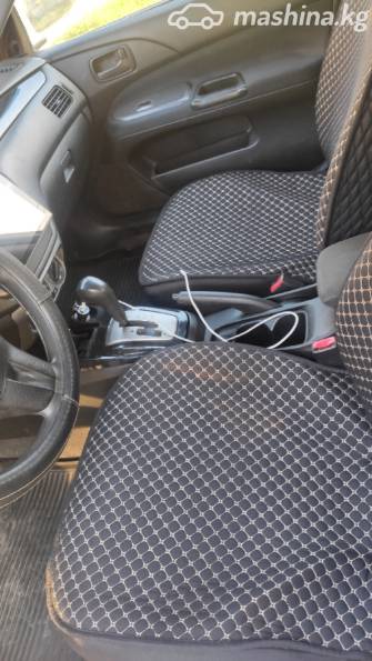Mitsubishi Lancer IX Рестайлинг 1.6 AT