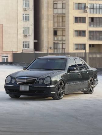 Mercedes-Benz E-Класс AMG II (W210, S210) Рестайлинг 55 AMG 5.4 AT