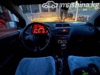 Daihatsu Cuore VII (L276) 1.0 MT