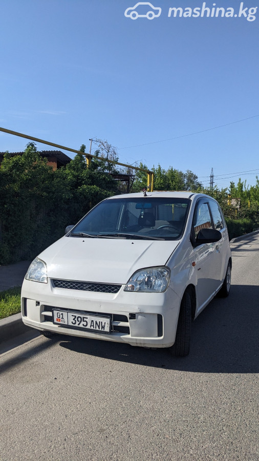 Открыть фото Daihatsu Cuore VI (L251) 1.0 MT