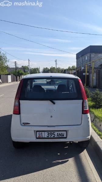 Daihatsu Cuore VI (L251) 1.0 MT