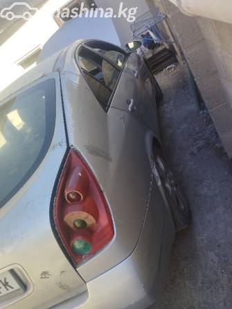 Nissan Primera III (P12) 1.8 MT