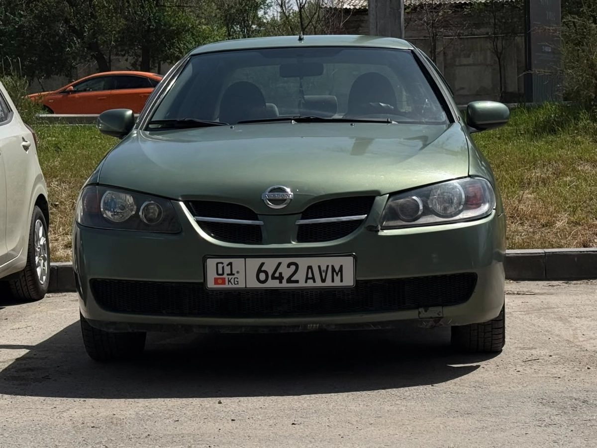 Nissan Almera II (N16) Рестайлинг 1.5 MT