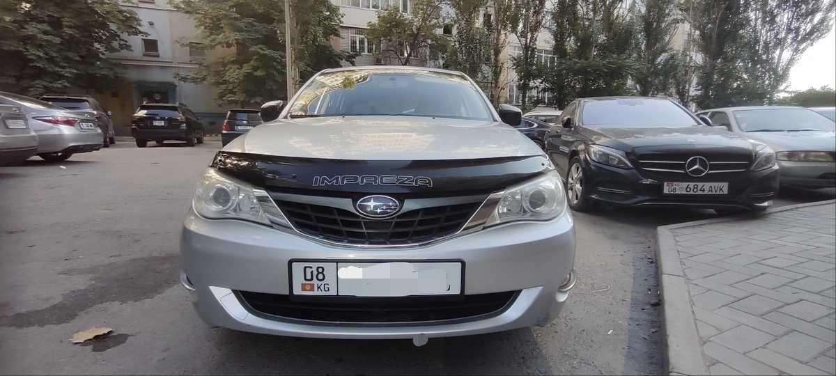 Открыть фото Subaru Impreza III 1.5 AT 4WD