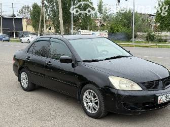 Mitsubishi Lancer IX Рестайлинг 1.6 AT