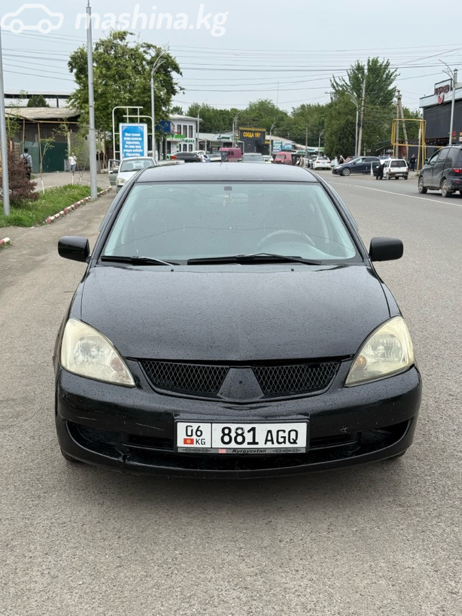 Mitsubishi Lancer IX Рестайлинг 1.6 AT